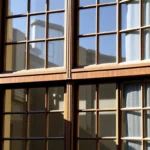 Heritage window restoration showcasing traditional timber sash windows being carefully repaired to preserve historical charm.