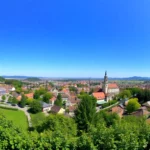 Saalfeld's picturesque town skyline with historic buildings and surrounding nature, ideal for a vacation backdrop.