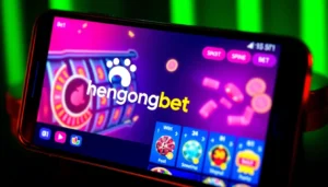 Hengongbet logo displayed on a smartphone screen with casino game reels, illustrating secure
