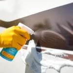 Effective Wohnmobilreiniger cleaning a RV's exterior surface with foam to remove dirt and grime